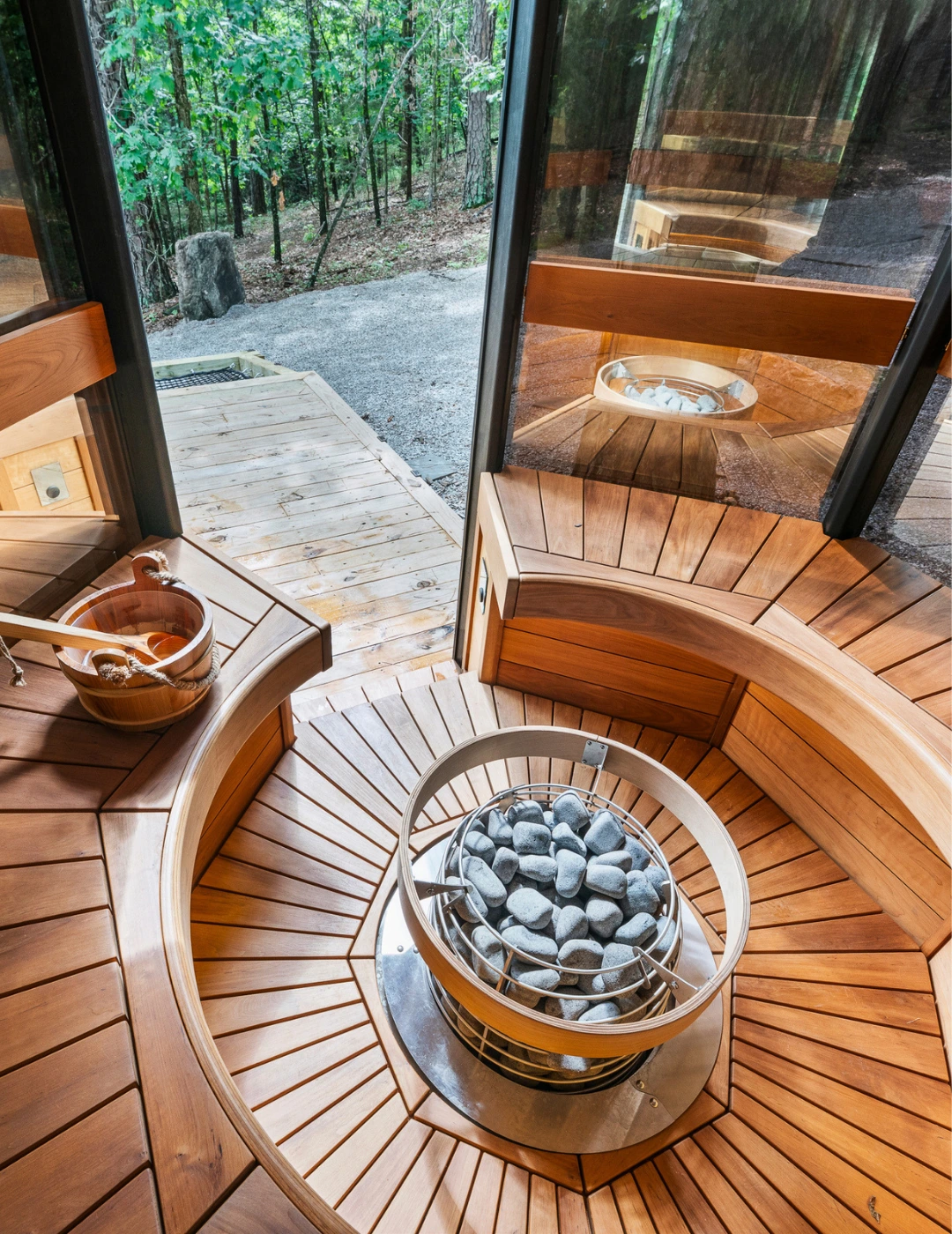 Interior of the round sauna with heated stones