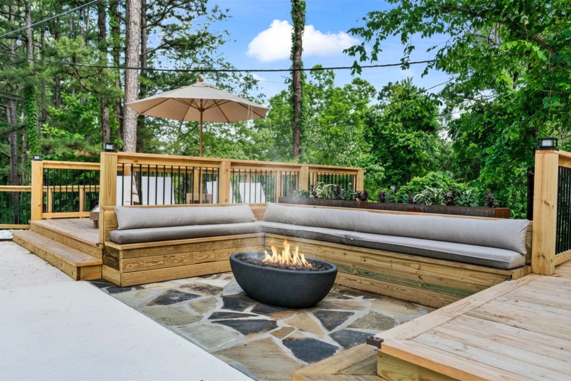 Quiet weekday pool deck surrounded by Ozark forest at Forest Springs Resort
