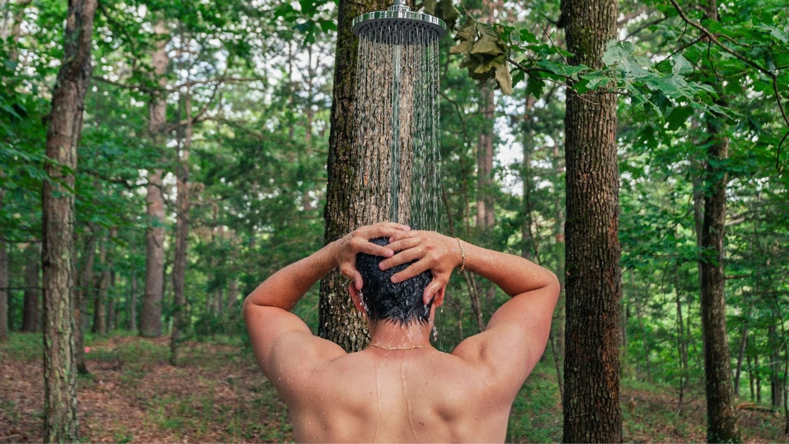 Outdoor forest shower amid Ozark trees