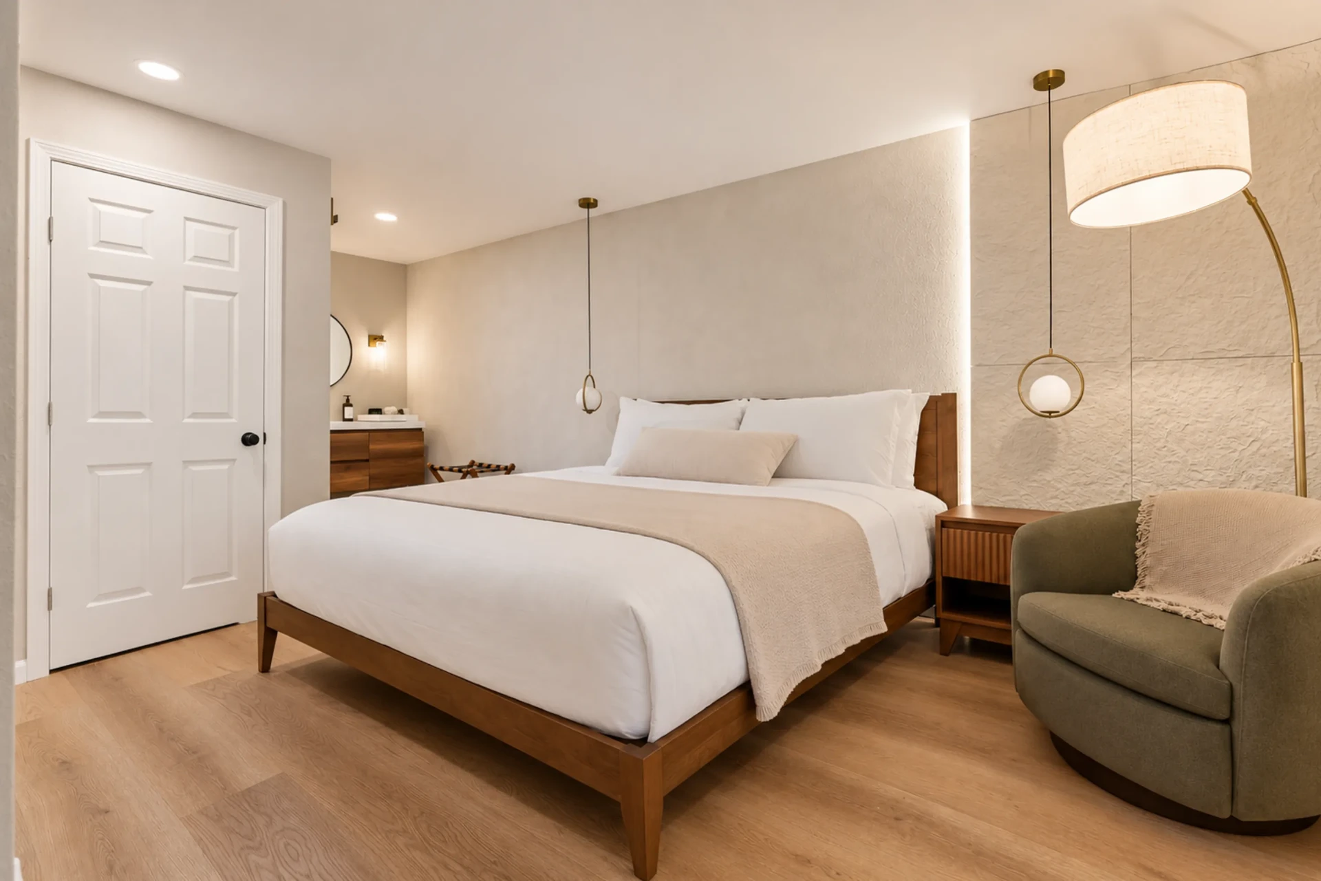 Modern suite interior with king bed at Forest Springs