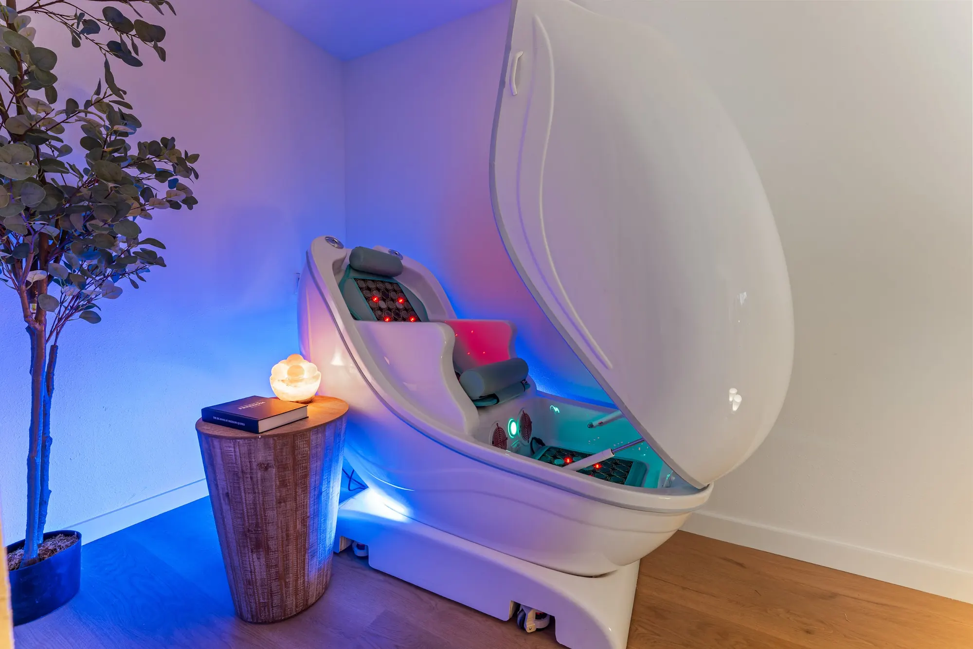 Infrared therapy pod in a softly lit wellness room at Forest Springs Resort