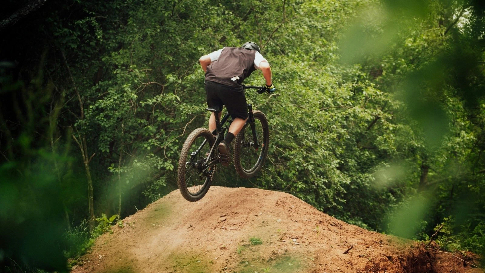 Mountain biking through fall foliage in the Ozarks
