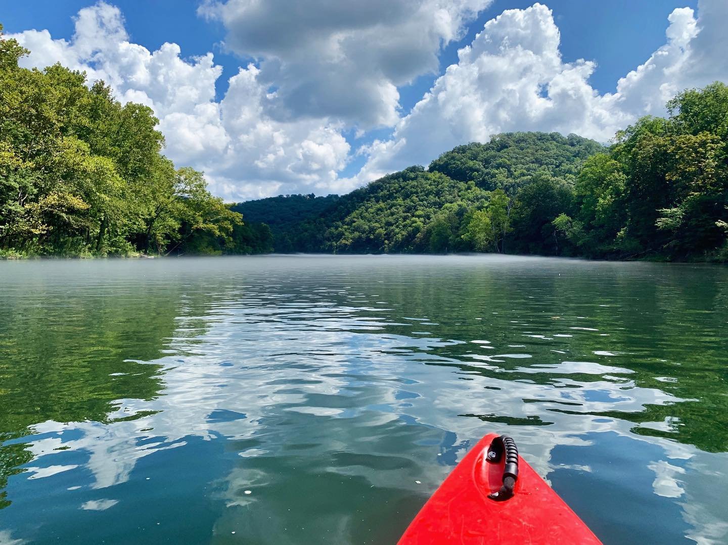 Kayaking on a calm Ozark lake