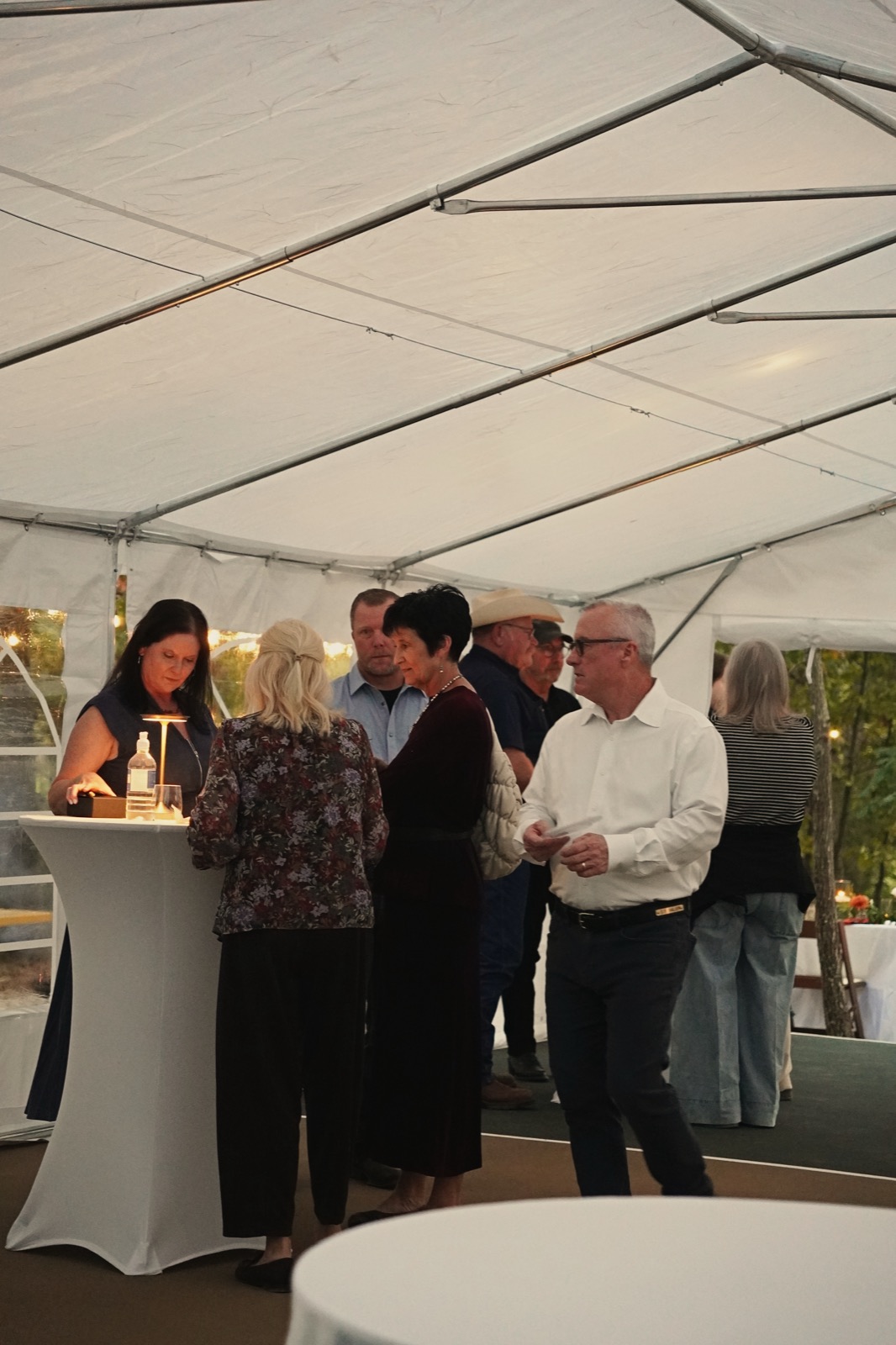 Guests gathered in the event tent at Forest Springs Resort